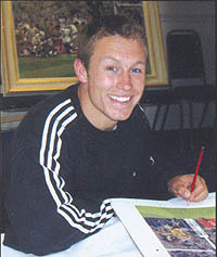 Jonny Wilkinson countersigning the prints